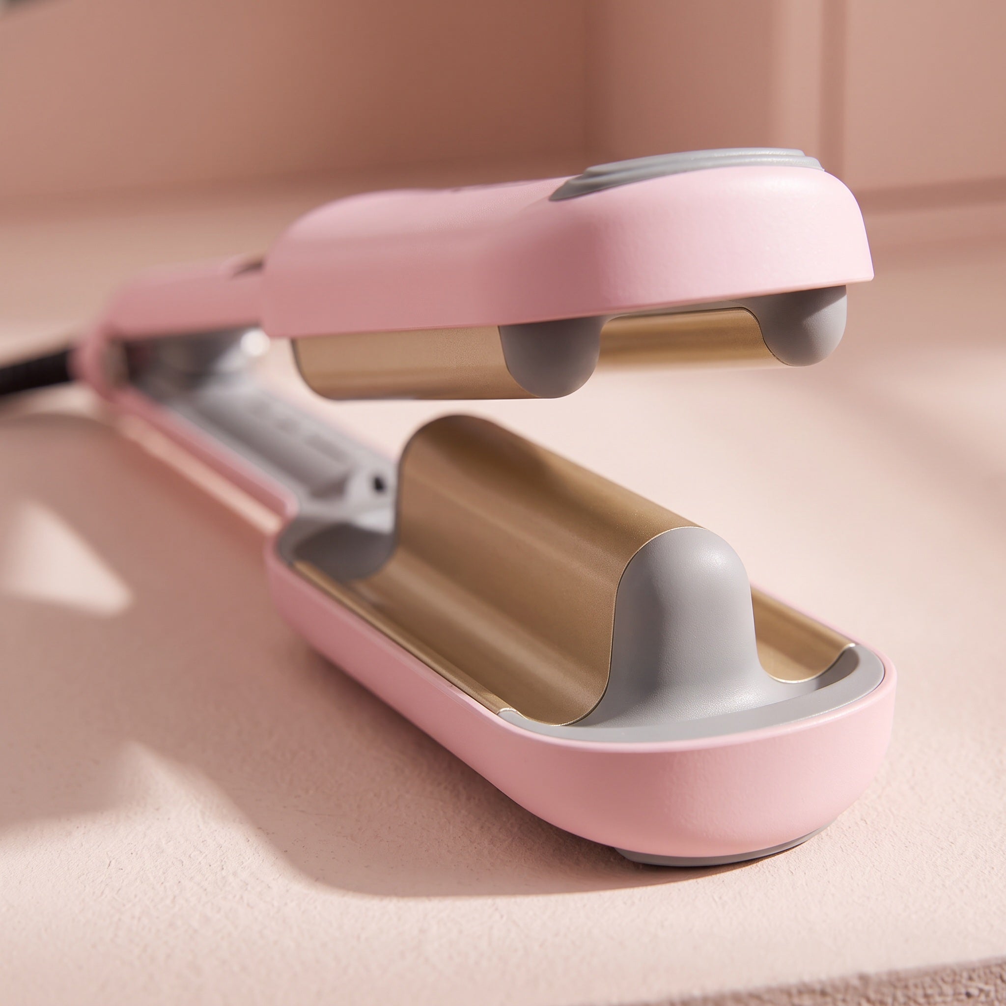 Pink waver and gold wave-shaped heating surface