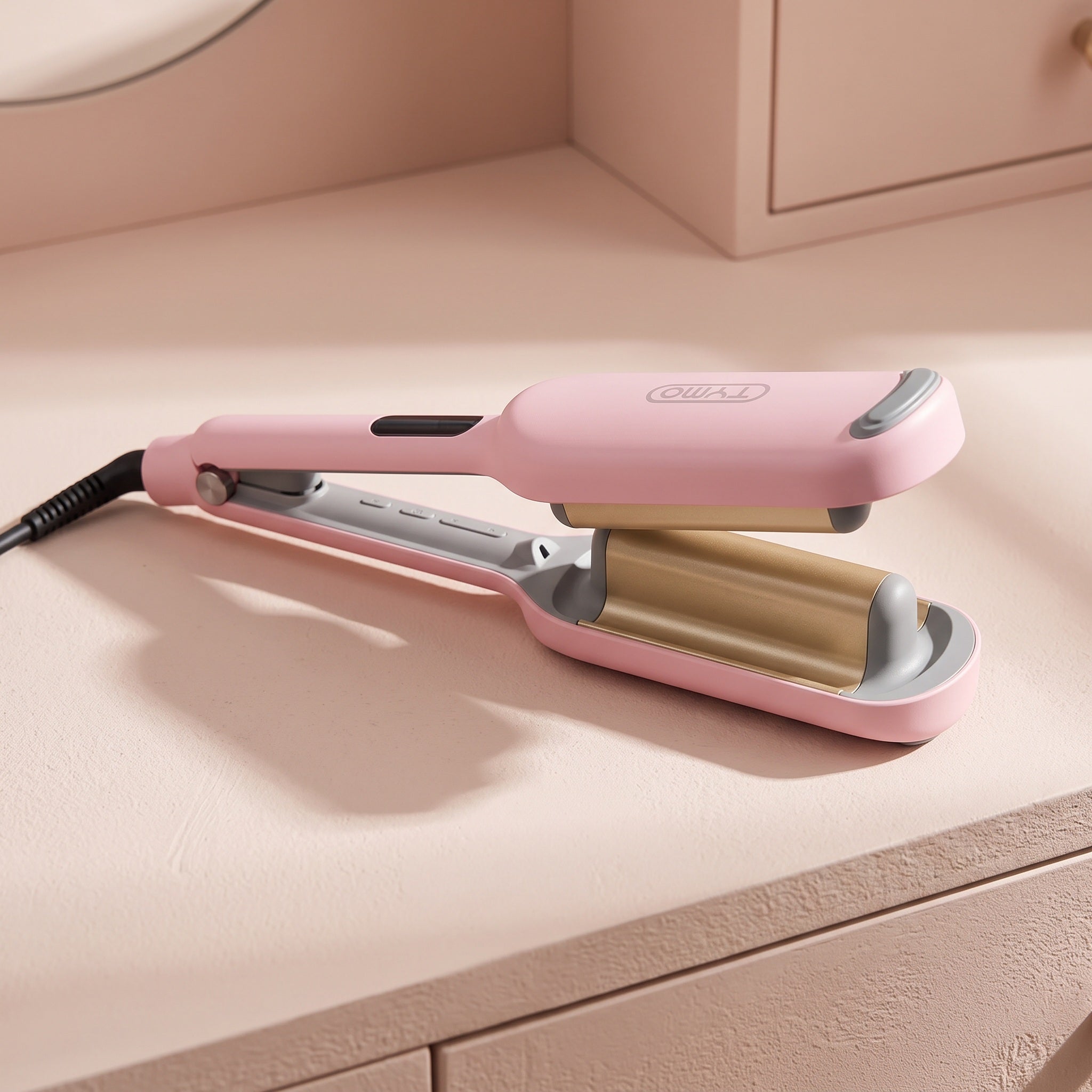 Pink 32mm (1.25 in) waver with visible clamp