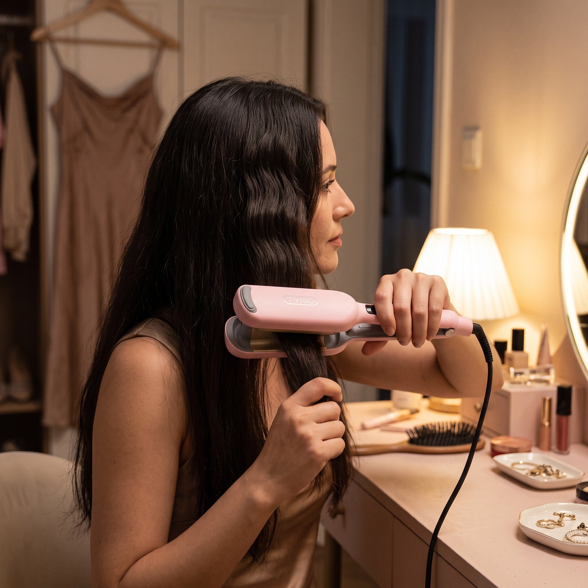 Adult styling dry hair before an evening out